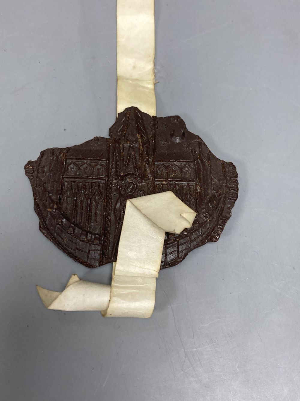 A 13th/14th century wax seal fragment of the Barony of Rye and an impression of the seal of Winchelsea, largest 8.5cm